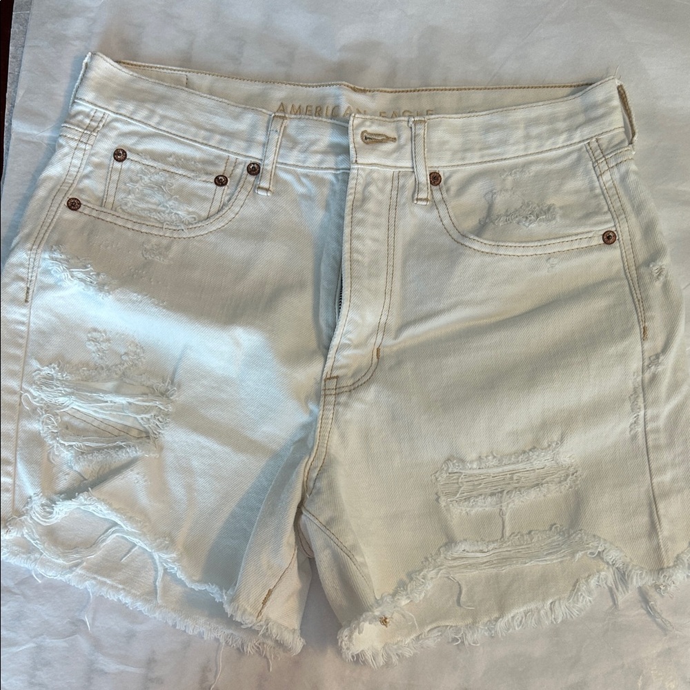 NWOT! American eagle White Distressed Denim Shorts. Size 6!